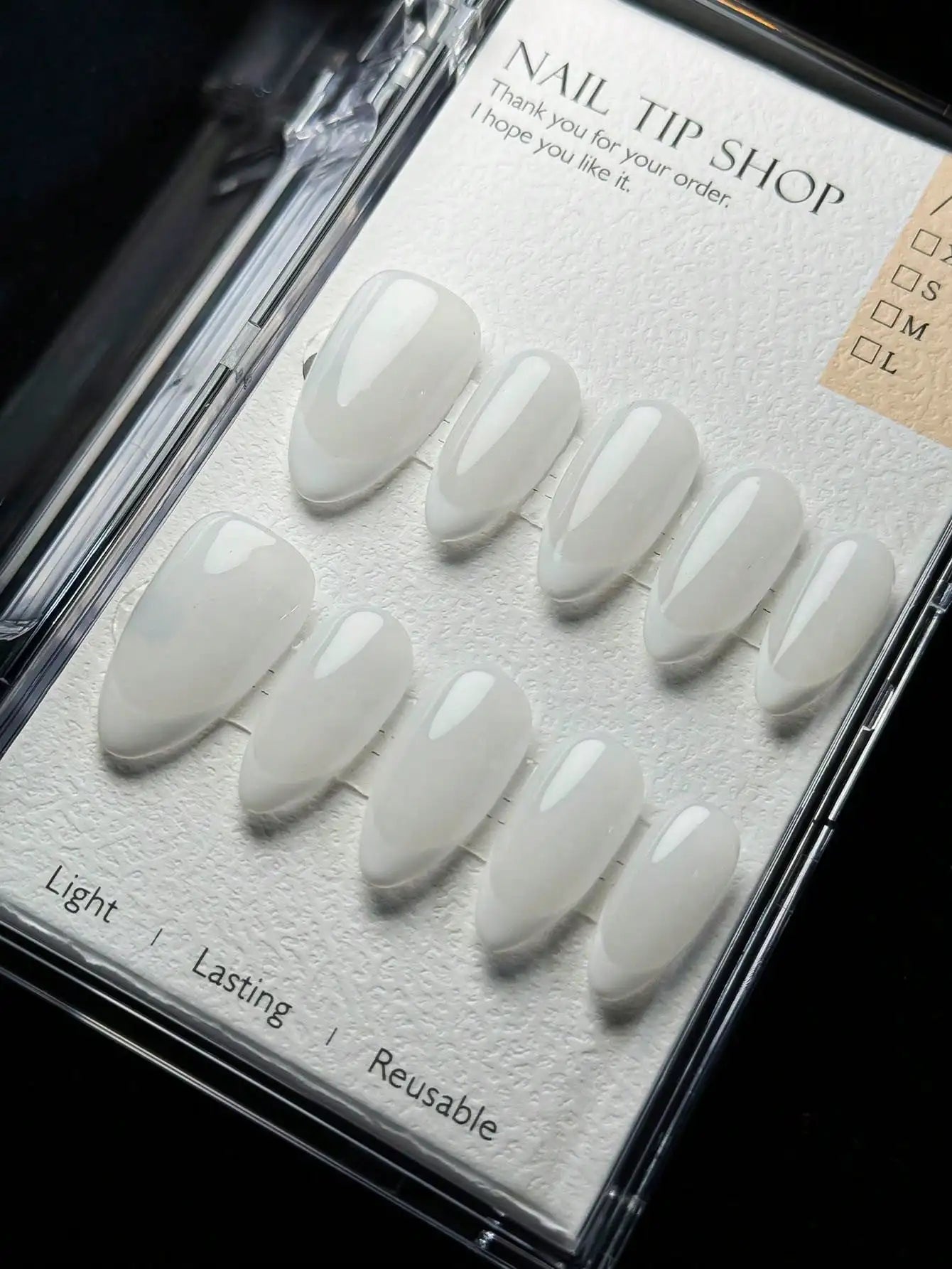 Almond-shaped French tip press-on nails