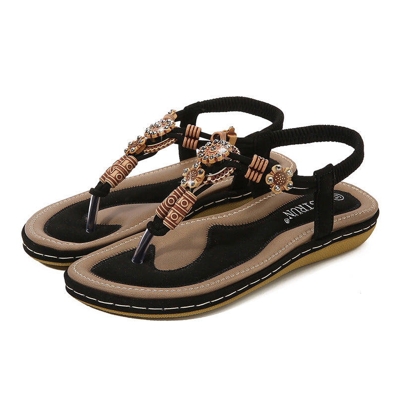 Toe post flats in black