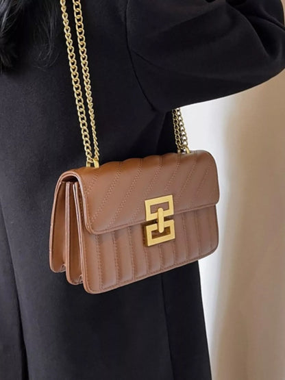 Quilted flap crossbody bag in Brown