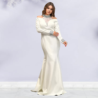 Solid color dress with wrapped arms and rhinestones