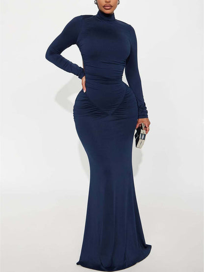 Backless long sleeved dress