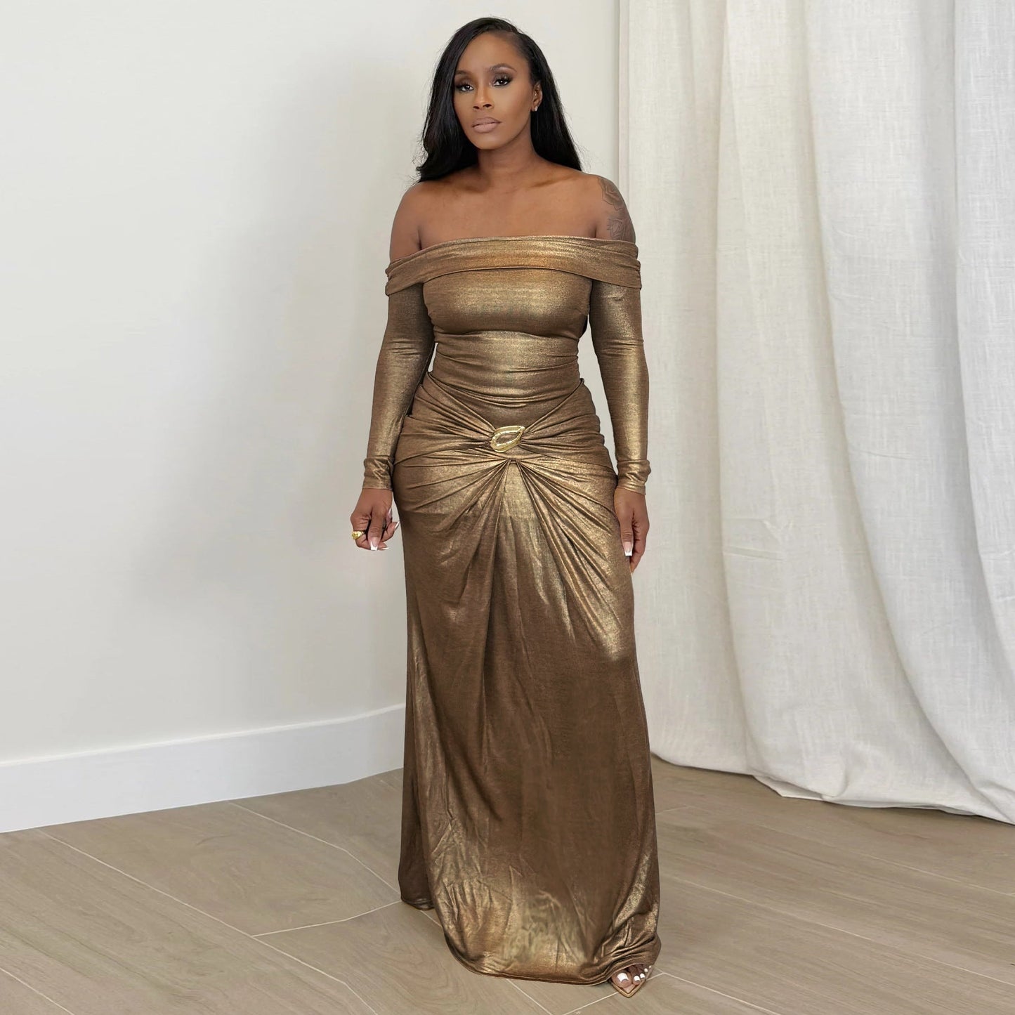 One shoulder long sleeved glossy dress