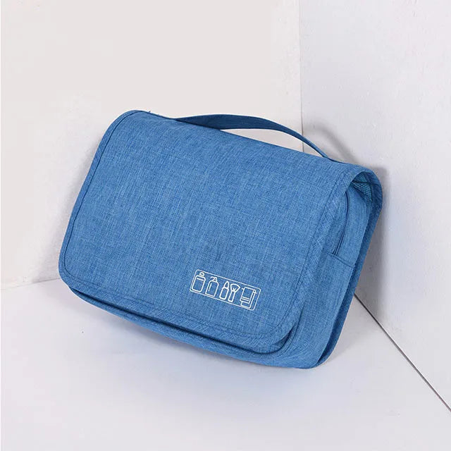 Hanging toiletry bag in Blue