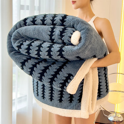 Reversible sherpa-lined fleece blanket