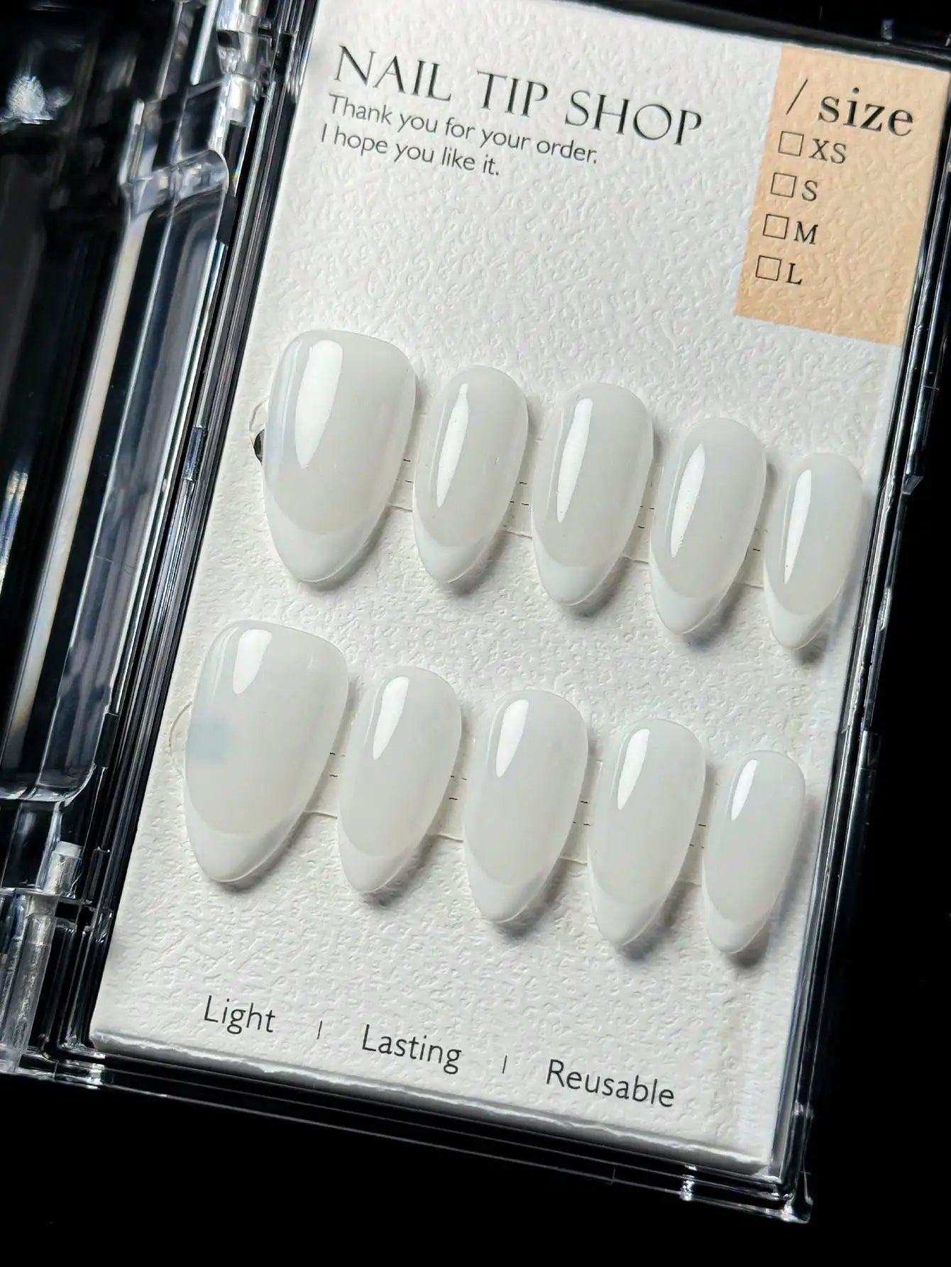 Almond-shaped French tip press-on nails