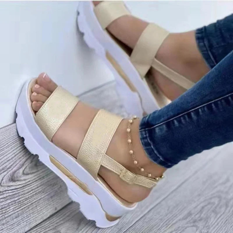 Buckle strap sandals in gold
