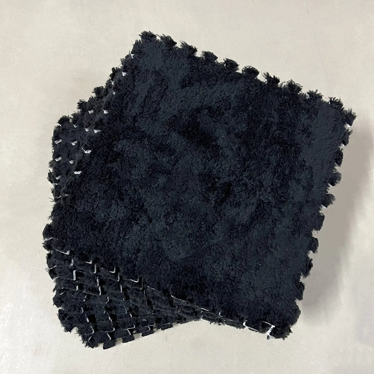 Plush foam play mat tiles in black