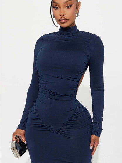 Backless long sleeved dress
