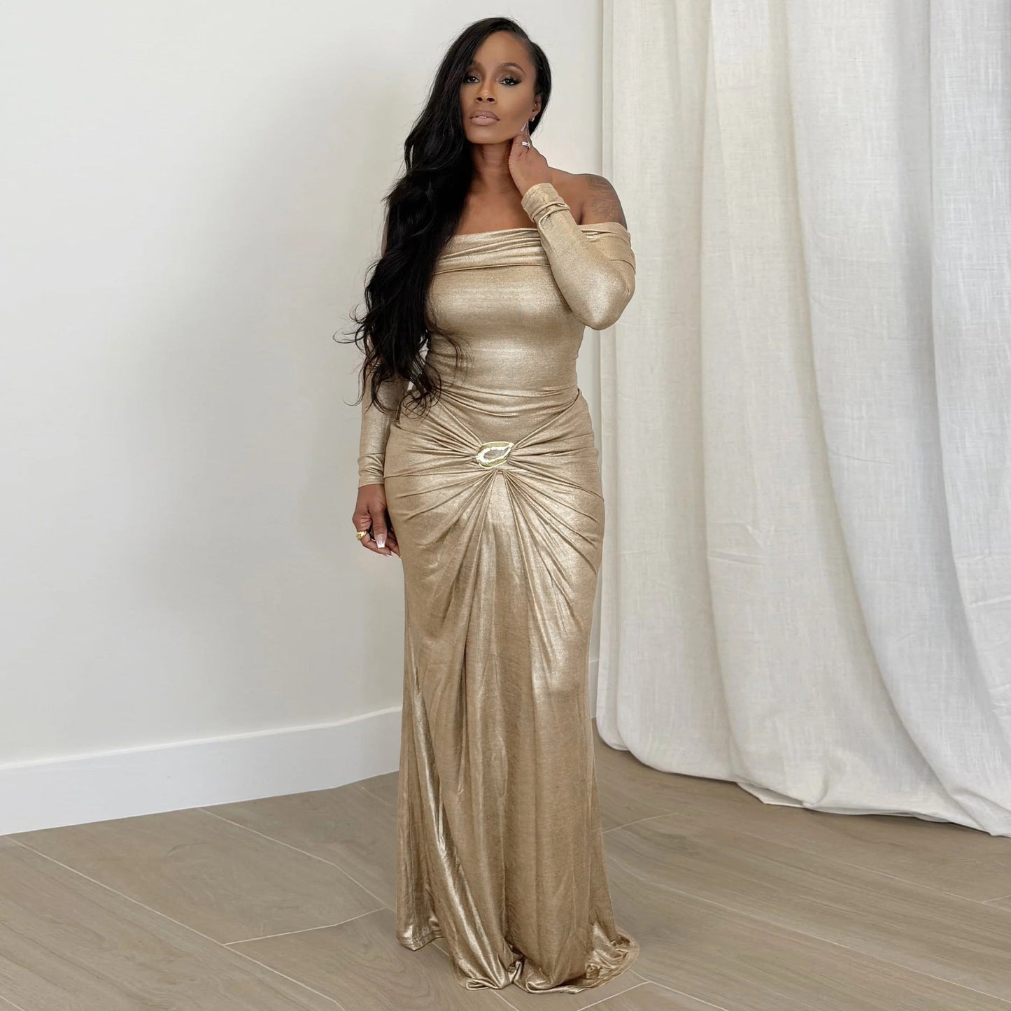 One shoulder long sleeved glossy dress