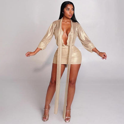 Transparent strap long sleeved top, hip hugging short skirt two-piece set