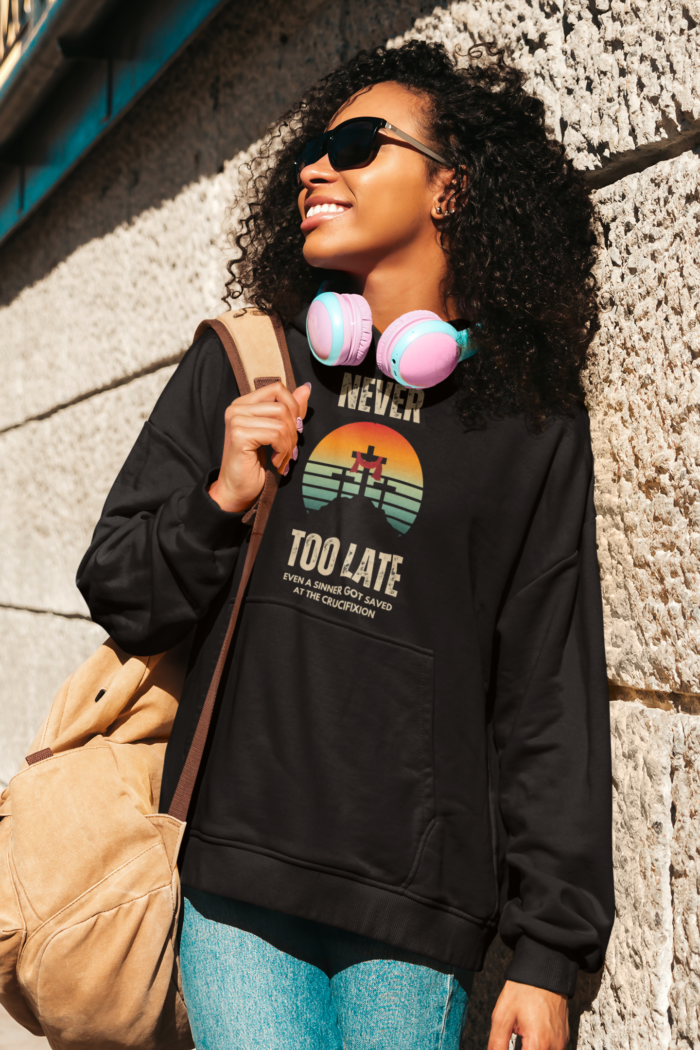 pullover-hoodie-mockup-of-a-woman-with-curly-hair-and-headphones-around-her-neck-m25394-r-el2